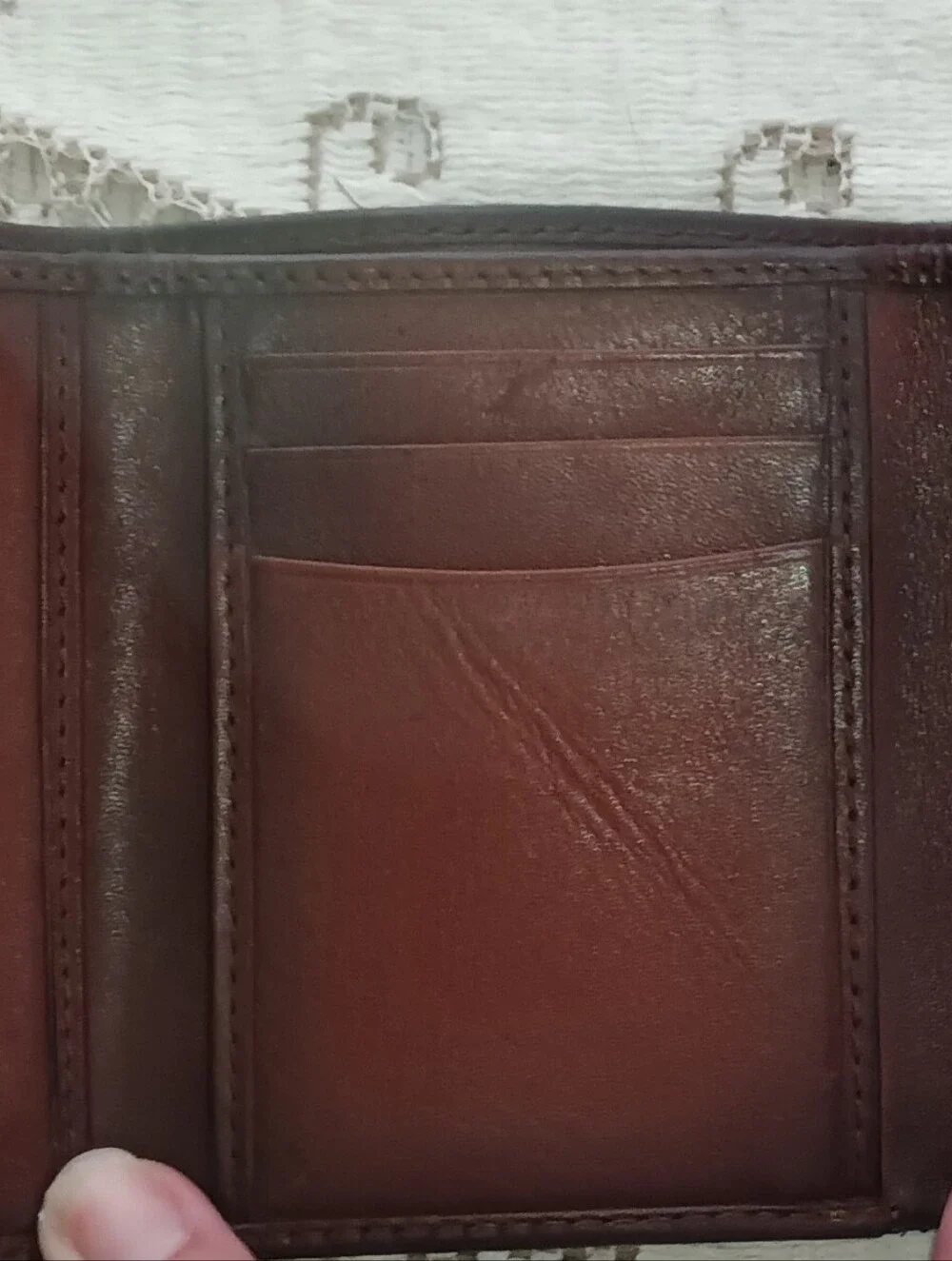 Men's Brown Leather Bifold Wallet with Embossed Logo Nash.